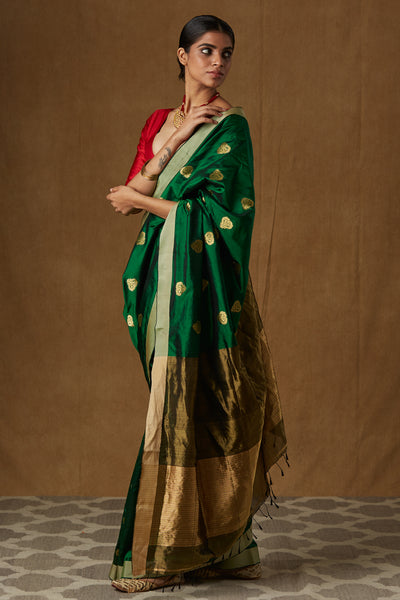 Premium Photo | Cultural Connection Adorable Indian Child in Rich EmeraldGreen  Silk Saree at a Cultural Event